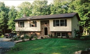 Charming 4BR/2BA Raised Ranch w/circular drive on 1.77 acre lot in private woodland setting. The home includes a large eat-in kitchen, living room, large family room, laundry room & extra large rec. room. The property also offers large deck, patio, shed Contingency: there is an individual with the right to purchase until 9/30/2006.
