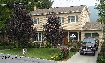 Spacious 3 BR, 2 BA, LR, Formal DR with hardwood floors, Oak kit w/breakfast bar and Jenn-Air range, 1st Floor BA, luxurious 2nd floor BA w/Jacuzzi tub, double sink, tile, skylight & chute.  FR walkout to Harley designed patio, Exercise rm, Laundry, Pellet stove, Abundant closets & storage, Central Air, Deck, Garage, Shed, Workshop, basketball area, lot 62x120, Pear trees...$169,000.   Call Janet Burley 814-942-3112.