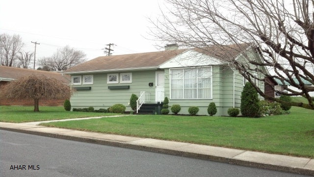 Spacious, 1 story living, hardwood floors, Great location!  Please excuse the clutter- family is preparing to auction off contents.  A portion of the basement is finished.  Cute package, nice lot- Better hurry!