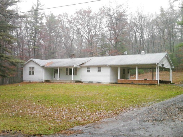 Very nice 3 bedroom rancher on 2.6 acres near Warriors Mark. Hardwood floors. Fireplace. 2 car carport. New septic.