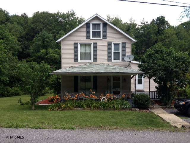 Beautiful home on private setting within the city. Property features custom hand built cabinets in the kitchen, main level laundry and plenty of space outside. All new windows, newer roof, and central air. Don't miss this property and all it has to offer.