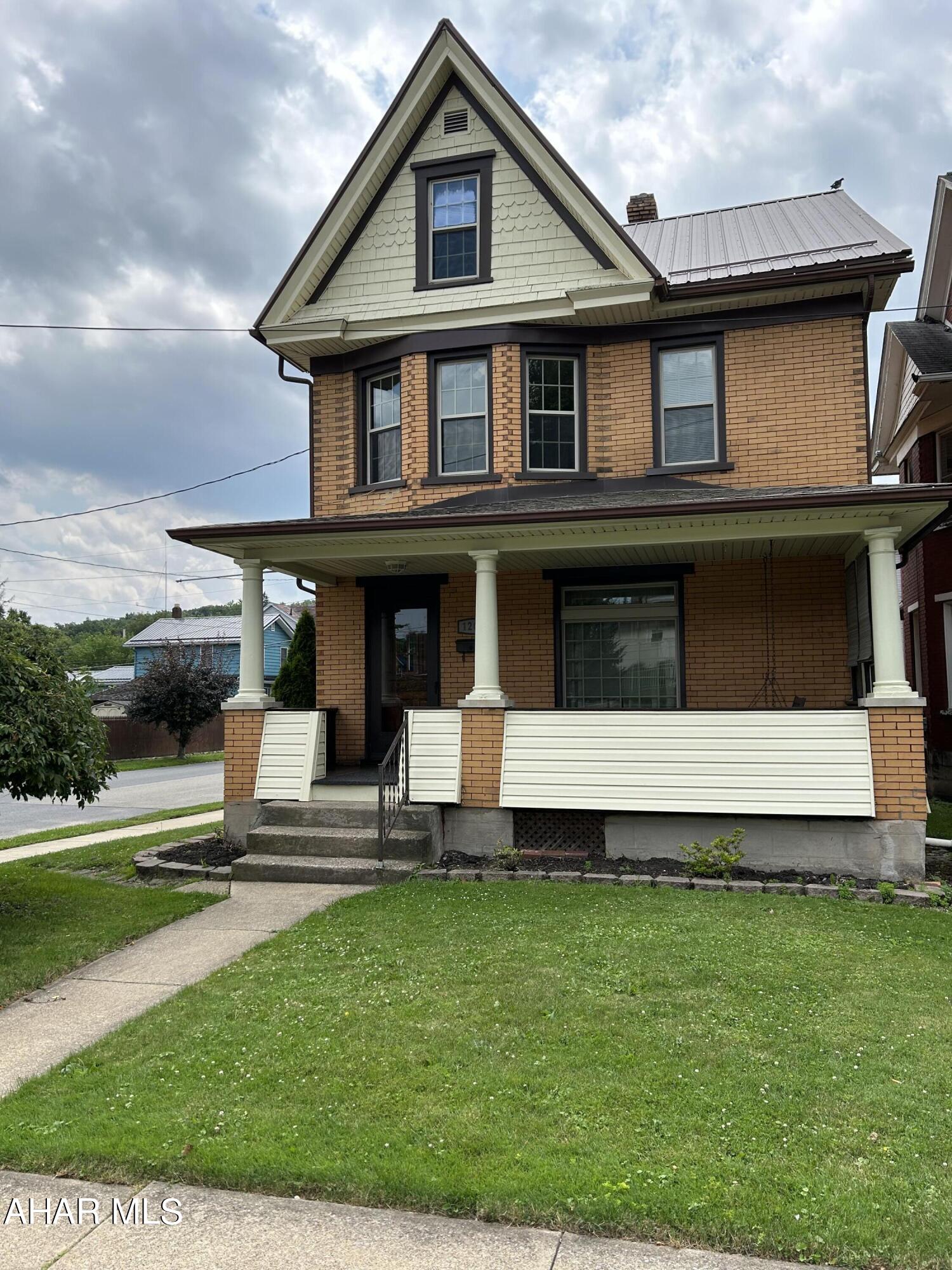 Home on Broadway. This single family 3 bedroom brick home located near the Penn State Altoona campus features central A/C, metal roof, newer windows, appliances, and more. Move in ready and waiting for you to tour. Schedule today.