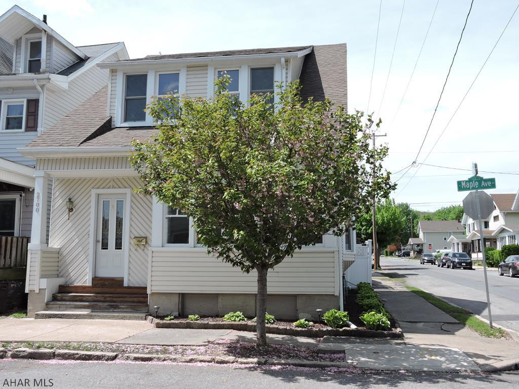 Sweet home with lots of original charm yet updated to modern standards.  Move right in.  Large bright rooms with original woodwork and working pocket doors.  Lead windows.