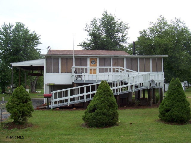 Residence or recreational property. Sewer is a conventionl system/holding tank. New foot pump with line in/out of well. New plumbing, new insulated walls, ceilings, and floors. New furnace and tank. New electric with 150 amp extra breakers for additional service. Stove and dryer have seperate 220 amp service.  NO fishing license required as long as you stay on property!!  Handicap accessible.