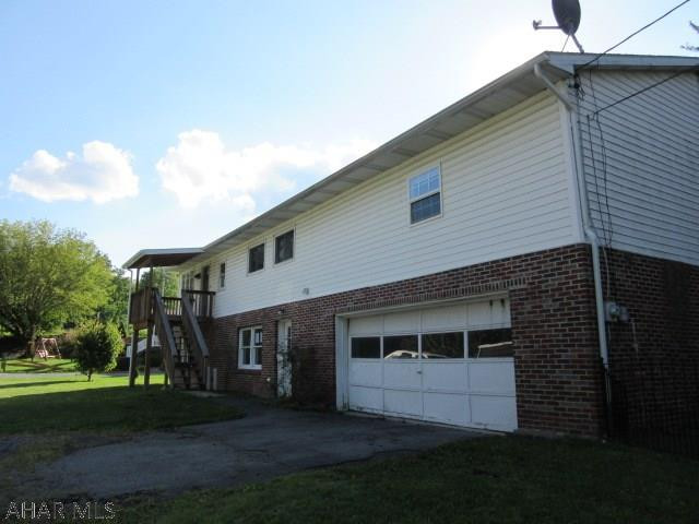 Close to Penn State Altoona campus and hospital, spacious raised ranch with lots of potential, at grade basement area could be finished for additional living area, open living/dining room area, large bedrooms, partially fenced in yard, Per Seller, all offers must be submitted via Hubzu.com.