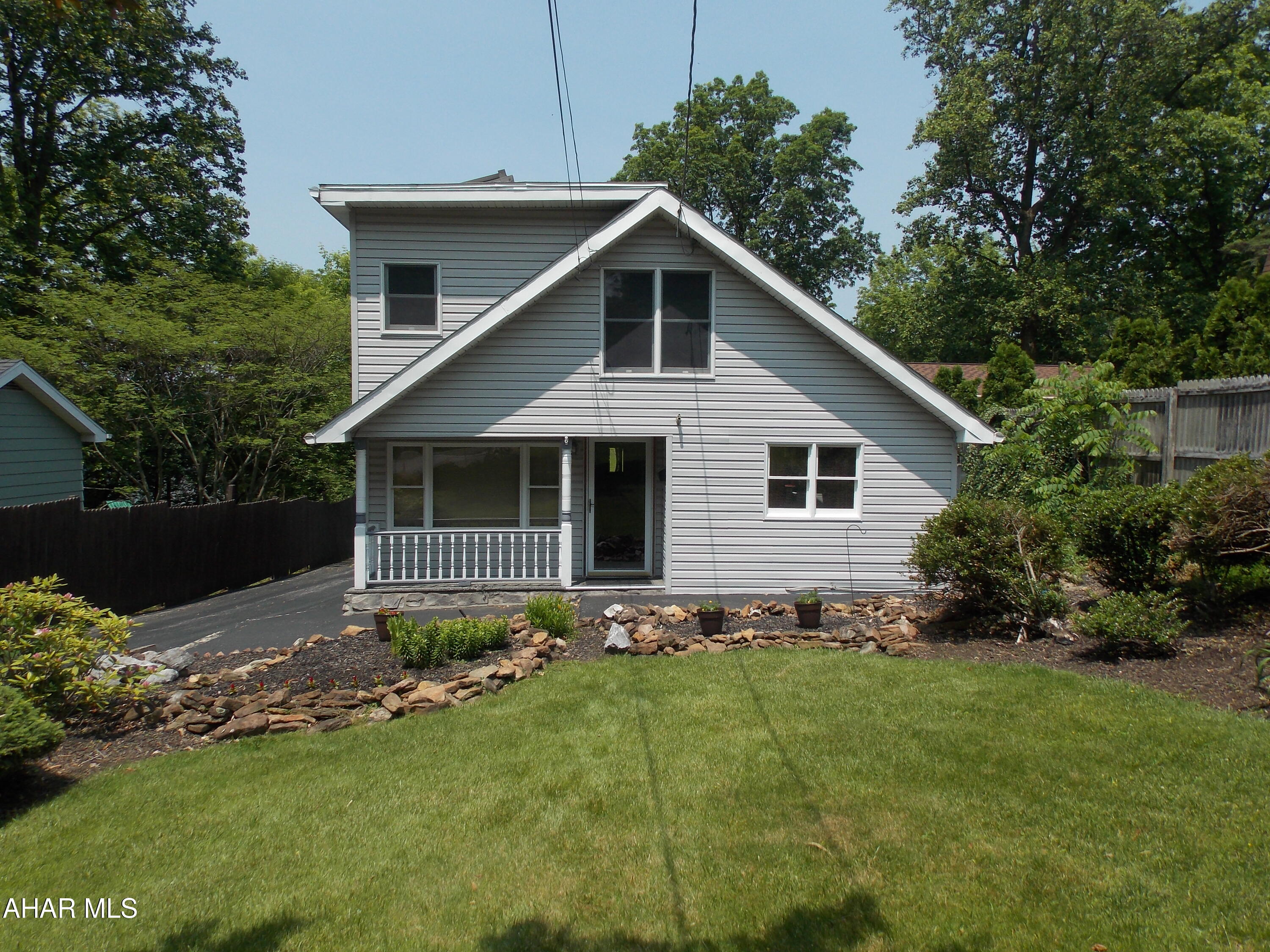 Welcome to 316 Forest Street.  This home is totally updated and ready for a new owner. The lovely eat in kitchen is very bright with vaulted ceilings and new skylights. The floors, backsplash and countertops are ceramic and there is plenty of cabinet space. There is dining room as well but the seller uses it as an office. The DR/Office opens to the deck, garage and back yard and there is more backyard behind the garage. Steps away is the living room plus another room for entertaining. (Previously this room was a bedroom. The first floor also has a new 3/4 bathroom.
Upstairs you will be in AWE of the enormous bath with a soaking tub and shower. The primary bedroom has great closet space and a deck looking  over the yard. The guest room is currently used as a den.
This is a perfect home if the new owner wants to board or groom dogs.  The kennels and grooming rooms are located on one side of the garage.
This home is move in ready and in a very convenient location. Schedule your showing today