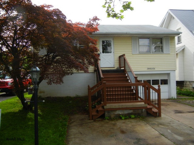 Nice property in Hileman Heights! Three bedroom, two bath raised ranch. Great great property! Beautiful decor, 1 car garage, enclosed back porch/sunroom, deck and more. A must see!