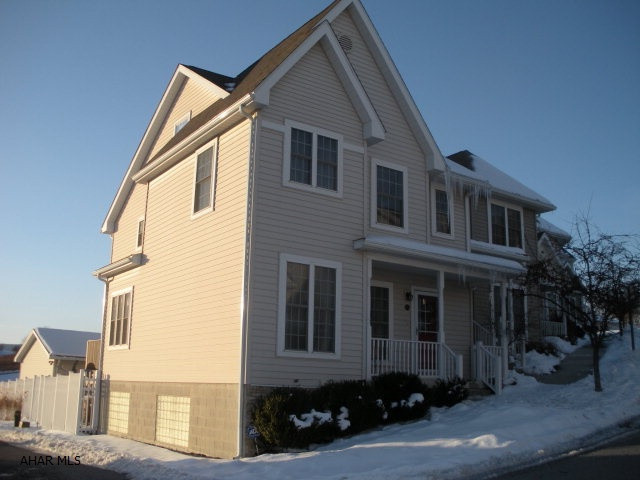 Here it is a rare find in Townhomes, 4 bedrooms, 3.5 baths.  Full finished basement, hardwood floors, great kitchen with stainless appliances, Island, large pantry, Corian counter tops, glass back splash, all 4 levels are finished living space.  Nice rear deck with awning, fenced yard.  2 car detached garage.  Ton of storage and closet space throughout this home.  End unit, central A/C/