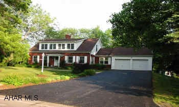 Lavish Master bedroom suite, recently added multi tier Cedar Tech deck with built in hot tub. Super kitchen, hardwood floors.