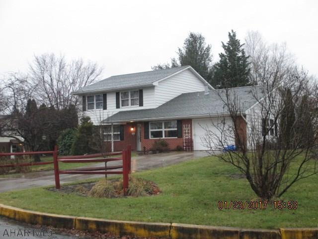 Nice Brick and Vinyl 2 story home in Duncansville Borough.  Has first floor family room, first floor laundry. Nice size rooms. Formal living room and formal dining room, den, 3.5 bathrooms Excellent condition.  Kitchen updated with New corian counter tops. Updated bathroom. Nice flat corner lot. Hot water heat and central air. Nice large driveway for extra parking. Roof installed 2014, Most windows are thermopane. Extra large finished, heated garage with numerous storage cabinets.  Pull down stairs for extra storage. Lots of Storage in the crawl space of the home. Jacuzzi tub in the first floor bath.