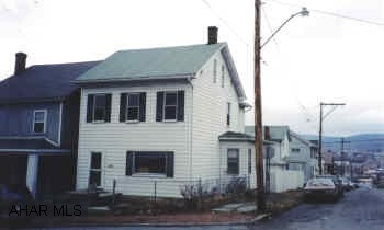 Lots of potential, garage, fenced yard, big kitchen
