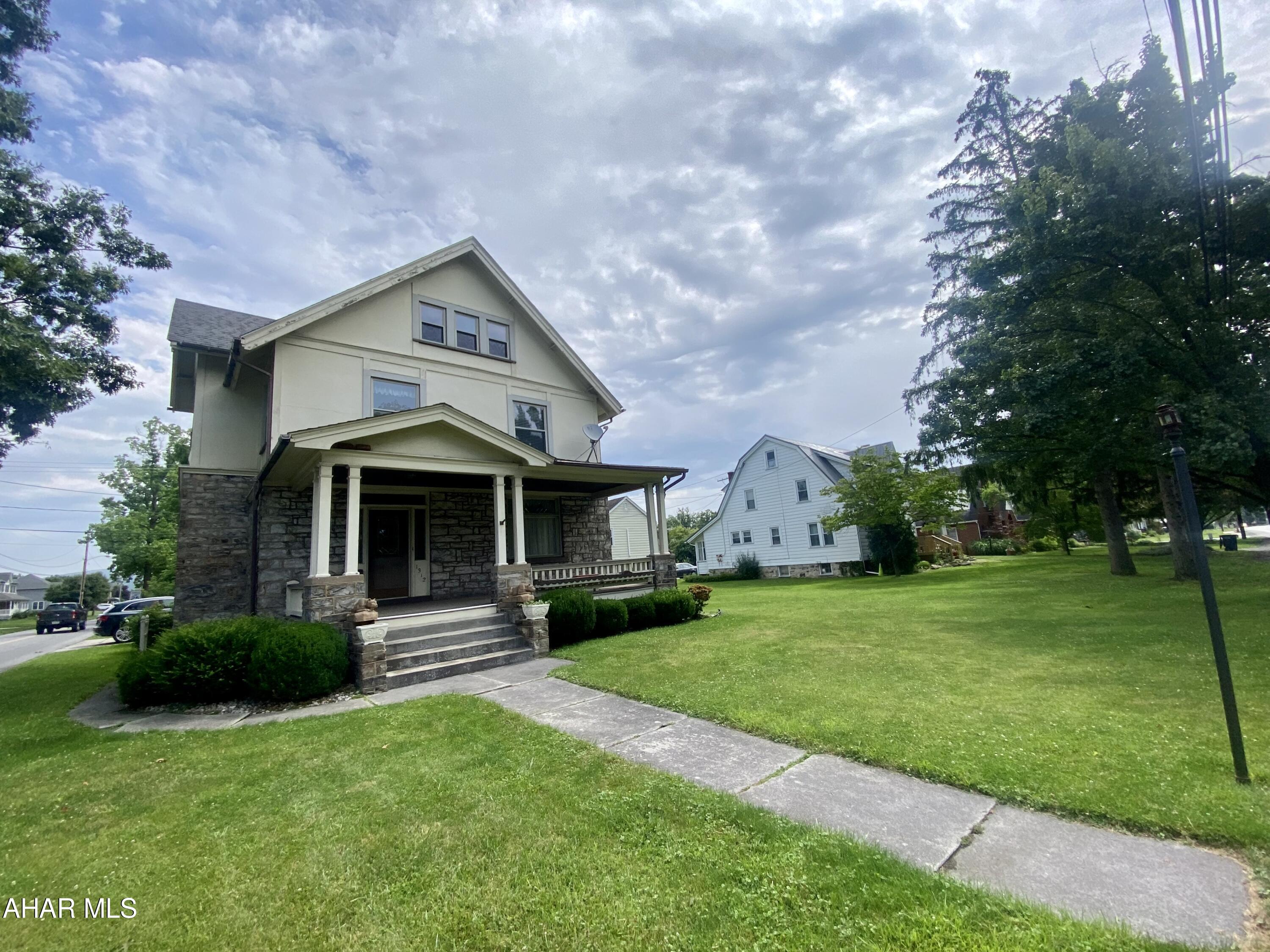 Located in the heart of Hollidaysburg this 5 bedroom 1 full bath has so much to offer with unlimited potential.  The first floor features an open floor plan with natural light.  The second floor has access from two separate staircases.  The exterior features a flat lot and two car detached garage.