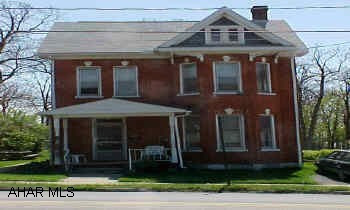 2 1/2 Story- Beautiful old brick home -Currently duplexed-updated wiring & plumbing Water & Electric have capability of being seperate- Currently all on one meter- Roof new 1997 Good Mechanics- Excellent investment