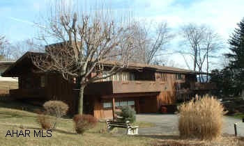 ONE STORY HOME IN BAKER SCHOOL AREA.  CONTEMPORARY CEDAR SIDED, 3 BEDROOMS. POOL AND MANY AMENITIES.  GAS FIREPLACE, EXQUISITE LIGHTING.  GALLEY KITCHEN, DECKS. HOME WARRANTY INCLUDED  $259,900.  ASK FOR JOHN REFFNER.