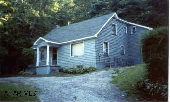 Well cared for Cape Cod on overall Acre - Private and serene! Lg. Family Room addition @ rear/inground pool.  Newer roof and furnace.