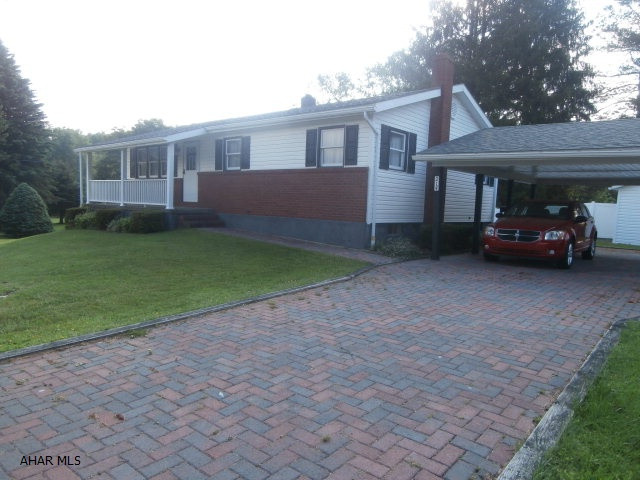 Very clean and well maintained rancher. EI kitchen, living room, three bedrooms and a bath. Basement has a family room with woodburner and great cabinet space.  Attached carport with brick drive. Good location. Good value.