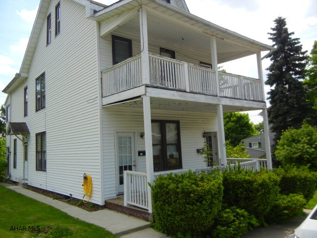 Exterior painting to be done as weather permits.  Vinyl sided except front porches.  Newer mechanicals in both units.  updated electrical.  All utilities separated.  First flr. unit has some hardwood & ceramic floors.  Second floor has all new carpeting and ceramic in Kit. and BA.  All appliances included.  NOTE:  both units can access basement for storage and laundry via separate entrances.