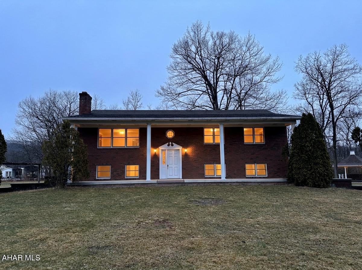 Stately bi-level home  on over two acres of ground in the Spring Cove school district waiting for a new owner.  All the work has been done including:  new flooring on main level, interior painting, kitchen countertop replacement,  new paint on garage floor.  Finished basement offers a family room and kitchen area great for entertaining.   From the basement you walk out to a patio at ground level with sliding glass doors.  Enjoy your spring and summer from gazebo with a beautiful; country setting.