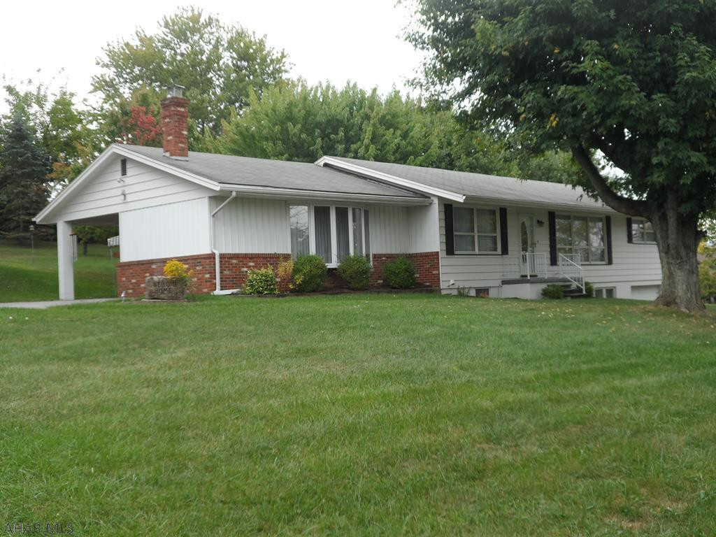 Country living in the city!  This spacious 3 bedroom, 1 1/2 bath ranch on nice 1 acre manicured lot.  Home offers spacious rooms, eat in kitchen with all appliances, first floor family room with wood burner, lots of storage, large bonus room in basement for entertaining, 2 sheds, and a play house too!