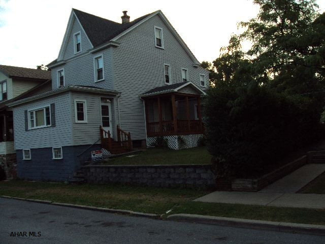 Nice rental property. Has gas hot water heat, 2 separate electric up and down, 2 water heaters up and down. Presently used as a boarding home. Many options, student housing possible, has fininshed 3rd floor. Second floor has 2 large bedrooms plus effeciency with living room, bedroom and kitchen. 1 bath on 2nd floor, 1st floor has 2 bedrooms and bath, plus enclosed front porch, living room, kitchen and separate bedroom with bath. 2 decks, 4 separate entrances, newer roof and double pane windows. Off street parking.