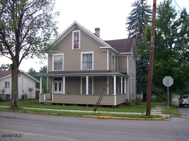 Large spacious Victorian style home, attic has 3 rooms that could be additional bedrooms.  Home has lots of potential but is being sold as is.  Shale driveway. Large corner lot.