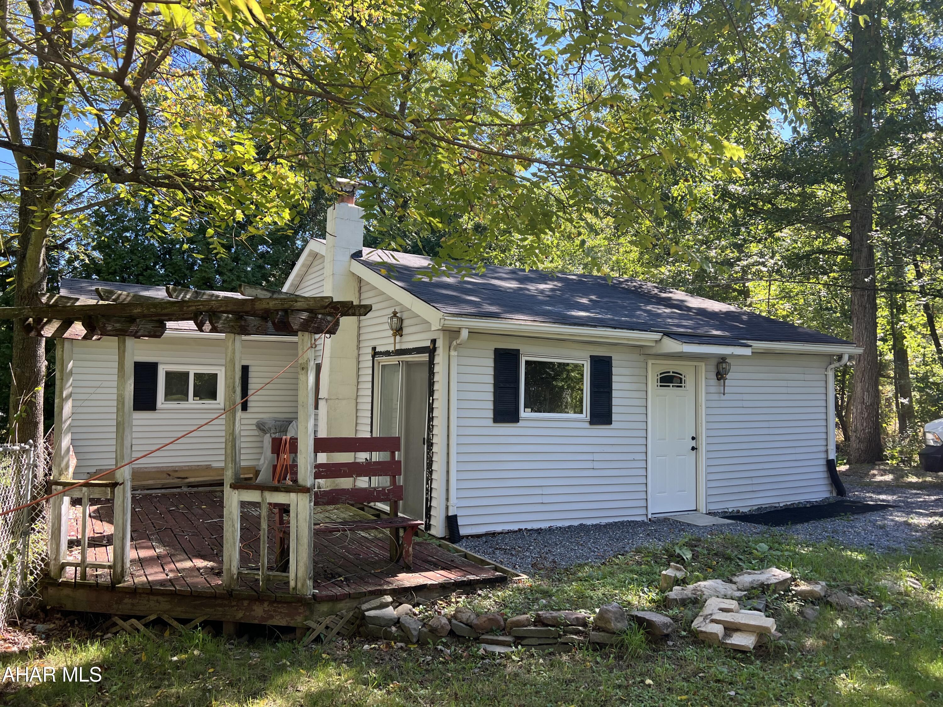 Sinking valley cottage or camp on a nice level lot off Kettle Street in close proximity to 11,851 acres of public Pennsylvania State Game Lands 166. Renovations started and need completed. Two bedrooms New well.