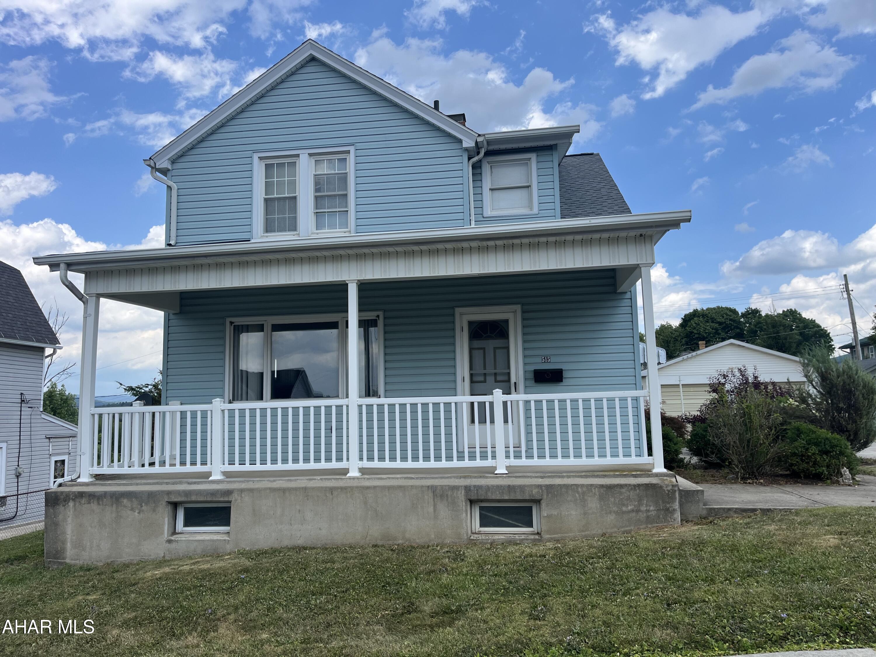 2 story with first floor bedroom and large living room. Also has 3 bedrooms on second floor. Enclosed rear porch/patio, 2 car garage on large level lot.