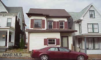 Large house with lots of potential.  1/2 bath and laundry on 1st floor.  Modern kitchen.  "BRING ALL OFFERS"!