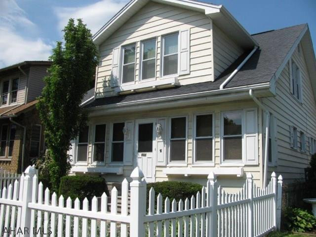 A White Picket Fence, paver walk and gardens welcome you to this charming Altoona home! This home offers LR.,w/ gas fireplace, DR. w/built in corner cupboard, EIK and a lg. Sunroom all on the first floor. 2nd floor features 3 spacious bedrooms w/ HWF, bonus room perfect for office or craft space and an updated bath! attic storage and built in hall unit provide ample space for your personal items! Fenced back yard w/ covered patio and porch and a detached 1 car garage w/opener complete this home!