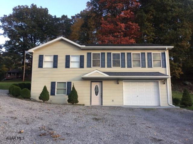 This raised ranch is perfect! Open concept living area with gorgeous mountain views from every room!Located in between Altoona and State College, perfect commute.
