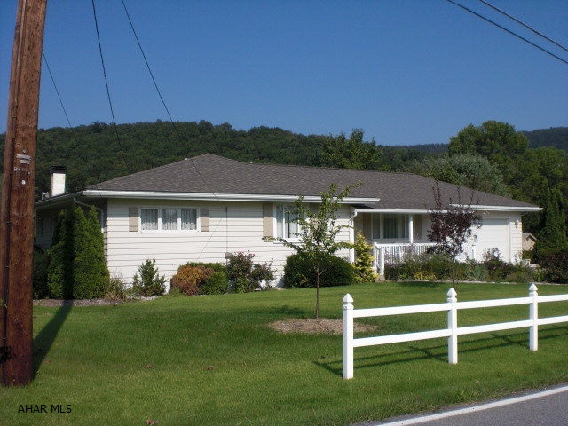 Beautiful ranch home with 4 ac lot that borders Canoe Creek State Park. Portion of yard is fenced in and there is a large storage shed. The family room could be used as a third bedroom. Basement is partially finished and has wet bar.