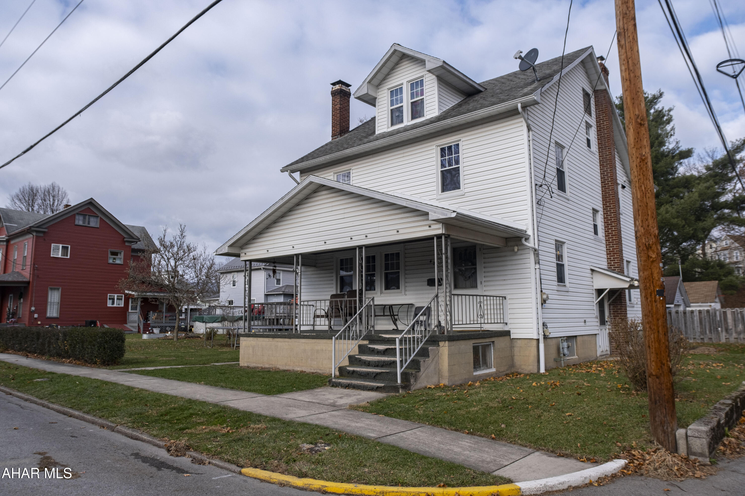 Bellwood Borough 4 bedroom home with garage on a level lot. Conveniently located close to schools and Main Street. Original woodwork including hardwood floors and fireplace. Needs TLC.