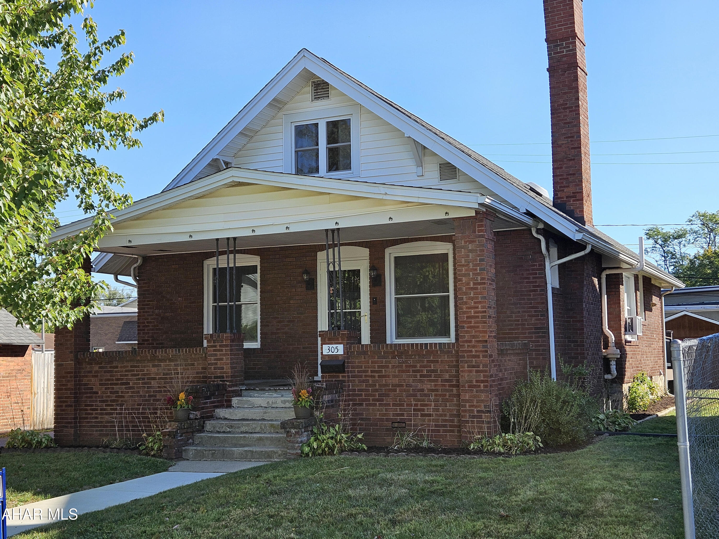 Step into timeless character with this beautifully maintained 1922 brick home, thoughtfully updated for modern living! Featuring 3-4 spacious bedrooms and 1.5 bathrooms, this home blends vintage charm with today's conveniences.

You'll love the updated kitchen with sleek Corian countertops and included appliances, perfect for home chefs and everyday living. The warm and inviting fireplace adds a cozy touch to the living space, making it ideal for relaxing evenings.

Enjoy outdoor living on the large, private deck, perfect for entertaining or unwinding in peace. A carport offers covered parking and additional storage.

Whether you're looking for classic charm or modern updates, this home delivers the best of both worlds. Don't miss this rare opportunity to own a piece of history with all the comforts of today!