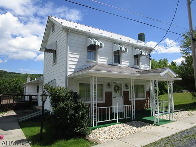Charming two story home with many updates.  First level includes a living room, kitchen, full bath, laundry room, large master bedroom with access to the deck and master bath. Second level offers two bedrooms and there is a walk-up attic for storage.  This home has been well maintained, offers a two-car detached garage and large lot.  Oil forced air heat, 200-amp electric, private well and public sewer.  This is a very nice home for the price!!!