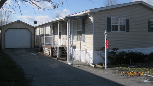 Double wide in the Henry Mobile Home Court Martinsburg. 3BR 2BA and detached garage. Lot rent is $200.00 includes trash. Nice view from home site.