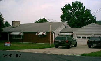2 Separate lots - 100x150 each - enclosed & heated breezeway.  Large Home.