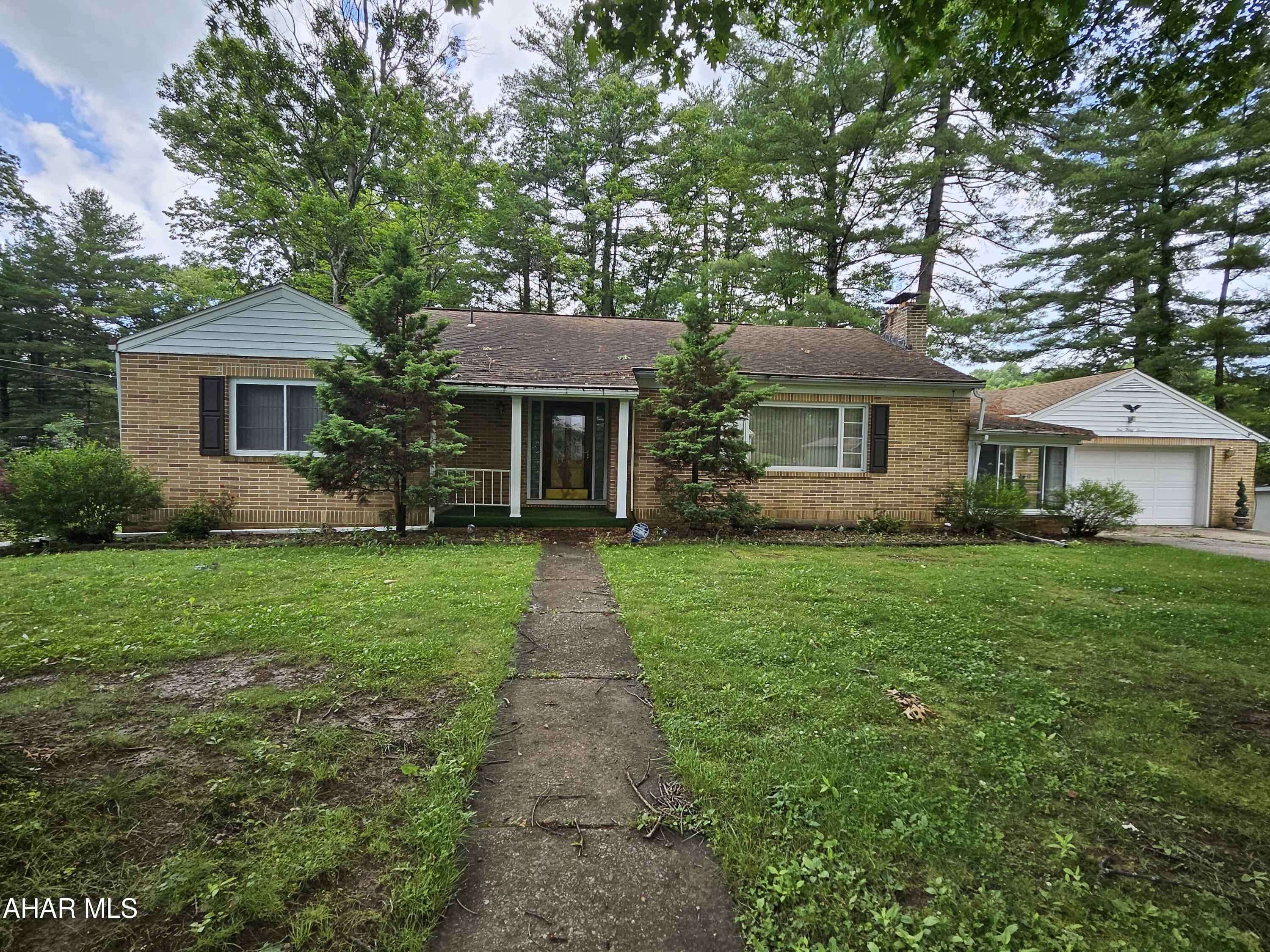 Charming One-Story Brick Home with Endless Potential.  This classic one-story brick home offers a fantastic opportunity for those with a vision! Nestled in the quiet, established neighborhood of Bellemeade, the home boasts a spacious layout with generous rooms that are ready to be transformed into your dream living space.
The home includes 3-5 bedrooms and 2.5 bathrooms, perfect for those looking for extra room to grow with the finished basement. The lower level could also serve as an income producing apartment or in-law suite!  The large living room provides plenty of space with a stone fireplace and expansive front window, while the kitchen, offers  space to layout your future renovations.  Be sure to explore the impressive sunroom off the back of the home, complete with skylights.  Plus, enjoy the added convenience of a generous breezeway that seamlessly connects the oversized two-car garage to the main house, offering both practicality and style. 
The 1+ Acre yard provides a blank canvas for landscaping or creating your own outdoor oasis, and the two-car garage offers additional storage space.
Ideal for those who want to add their personal touch, this home offers great bones, a highly sought after location, and the opportunity to make it truly shine with the right updates. Don't miss out on this promising opportunity to create a space that's uniquely yours!