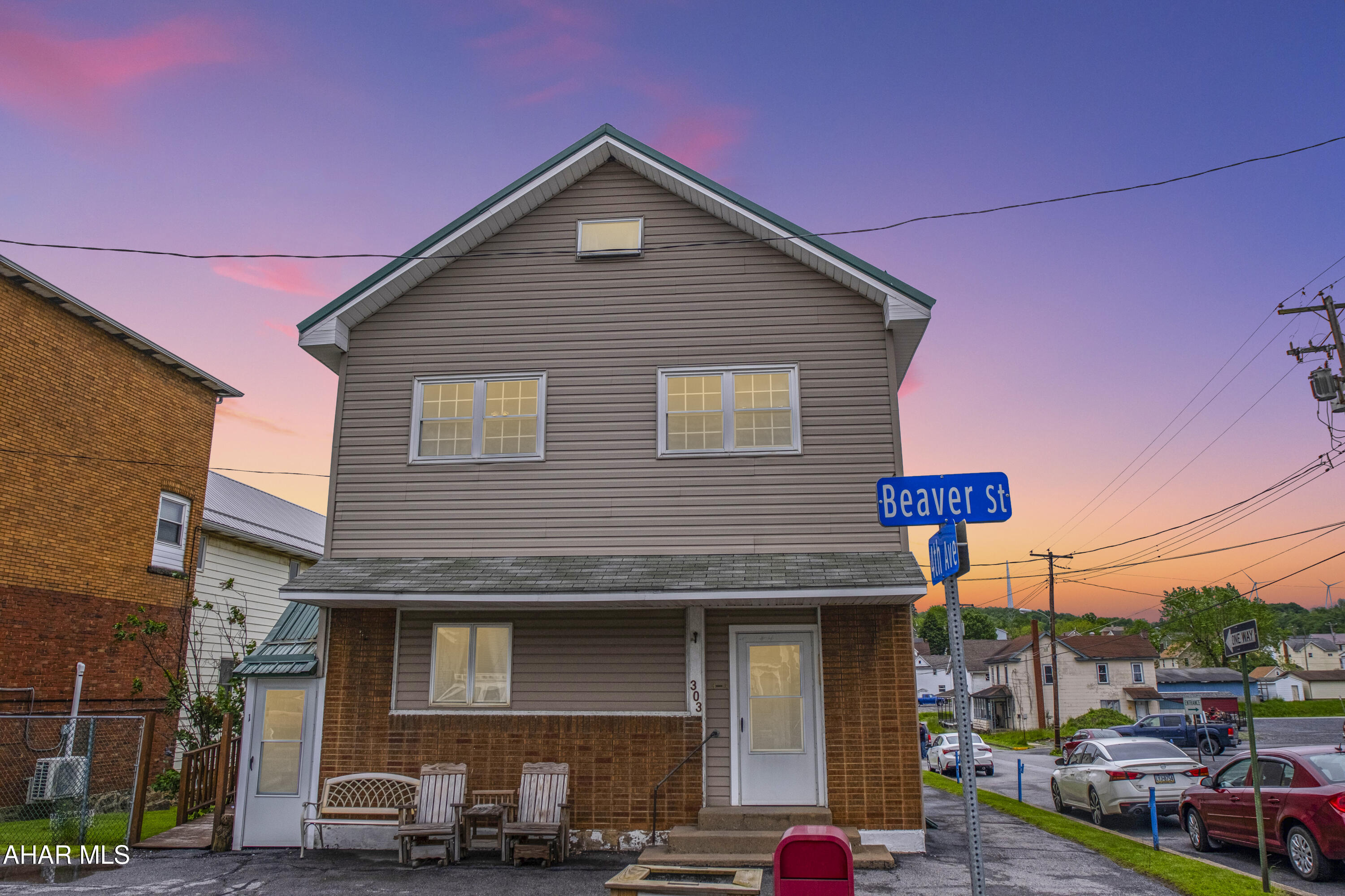 Attention investors! Seize this incredible opportunity to acquire a robust income-generating property in Hastings. Situated on a prime corner lot, this building offers four spacious apartments and is just a short walk to local amenities. Boost your rental income further with a three-car garage out back, perfect for additional tenant storage or separate rentals. Plus, enjoy the convenience of paved off-street parking and a handy side yard with shed. A newer metal roof adds to the property's appeal and durability! Ask Listing Agent for links to the Matterport Virtual 3D Tours of each apartment!