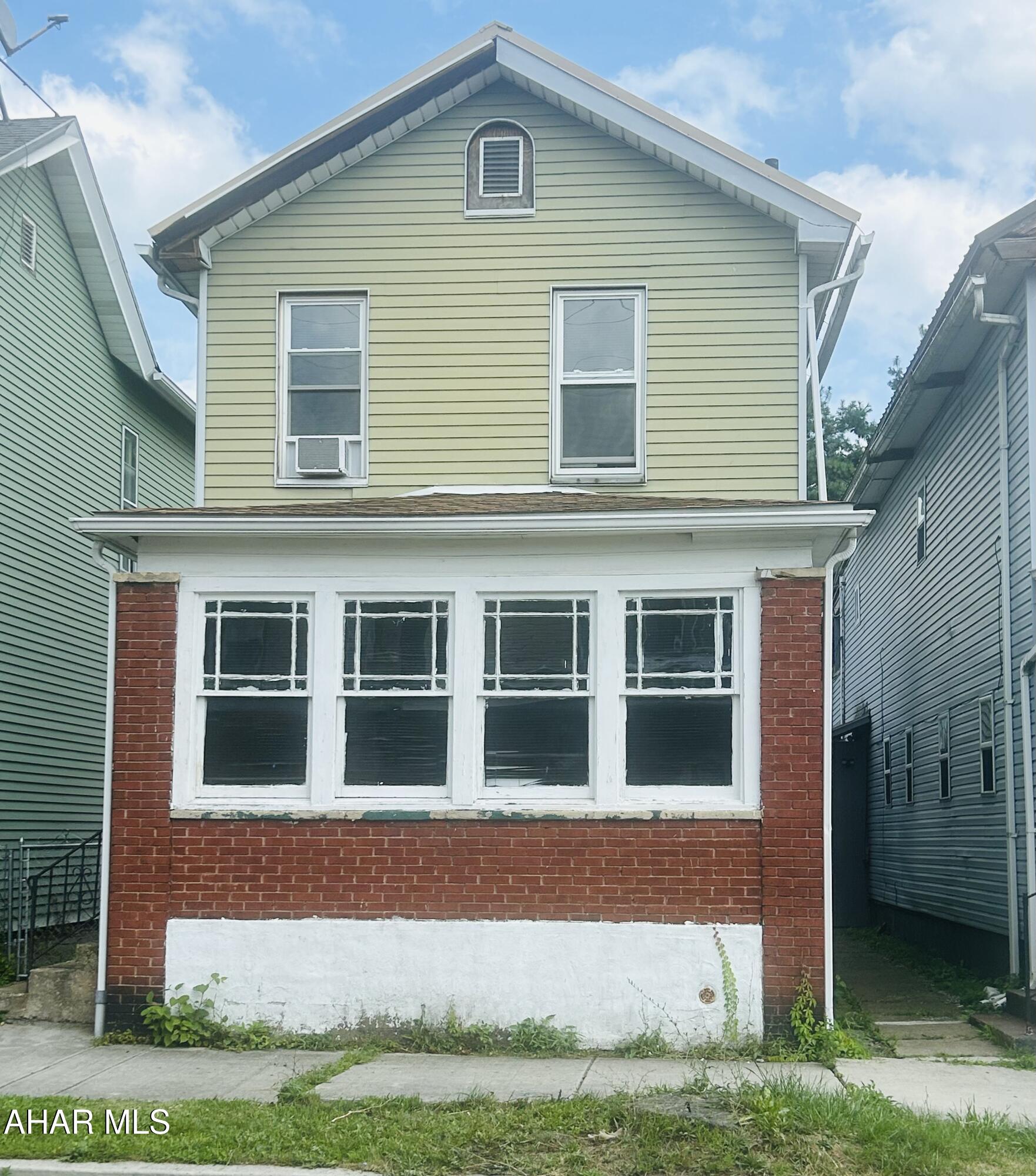 House is currently used as an investment property with rental certificate but can be a great house to update and make your own.  The back yard is fenced in with 2 off street parking spaces, has first floor laundry, and a closed in front porch.   Tenant will need 24 hour notice and may be present during showing. Current lease is available upon request.  *Only a few photos to respect the tenant's privacy.