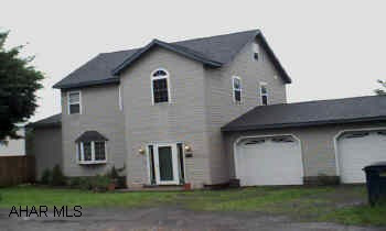 3 story vinyl. Large house, completely remodeled, new well in 2002.