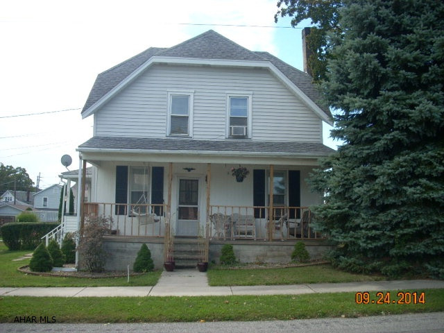 Cozy 3 bedroom home with new bath in quiet neighborhood in popular Bellwood.  Large covered front porch, detached garage.  Newer roof and siding, new hot water tank, new updated electric panel.