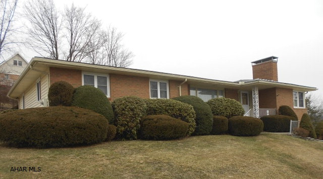 Walking distance to PSU Campus. Corner lot. Possible Mother In Law Suite. College student rental. Large rooms. Closets glaore. Thermopane windows. Family room with pegged hardwood floors and gas fireplace   Kitchen has corian counter tops