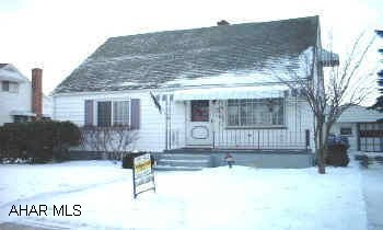Lovely 4 BR Cape Cod, larger than it looks!  Modern kitchen with cherry cabinets, new bathroom, hardwood floors, finished basement and central air.  1 car detached garage with attached sunroom, great for summer entertaining.