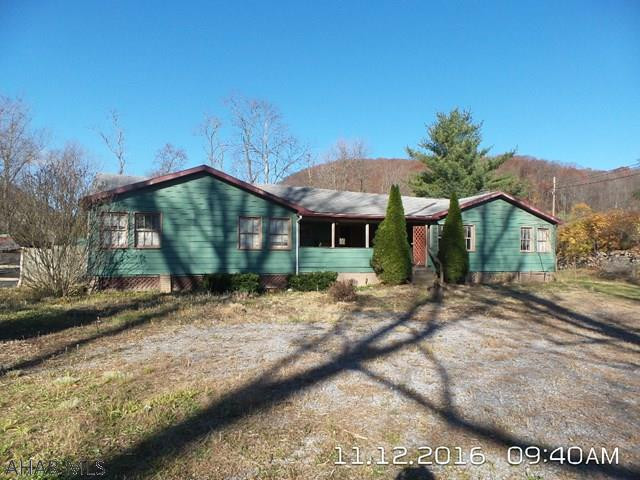 4 bedroom one story on 1.5 acres adjoins Rails to Trails.  Property has so much potential but needs extensive work.  Utilities are not functional so cash buyers only.