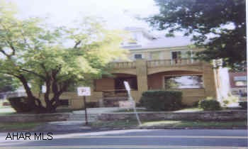 4-Unit Brick.  Nice apartments, nice location 4 one bedroom apartments.  Refrigerator, stove, carpeting.
