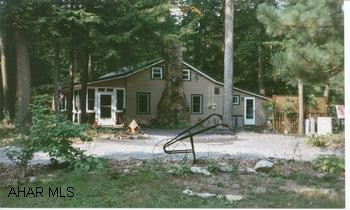 Sweet cottage for year round use or weekent getaway! All modern conveniences. Newer windows, roof, & siding.  Lovely treed lot with two streams.  Hot water tank & stove are propane.  "Seller will consider all reasonable offers." Twin Creek Villa.  Sweet cottage for year-round use or weekend getaway!  All modern conveniences.  Newer windows, roof and siding.  Lovely treed lot with two streams.  Hot water tank and stove are propane. "Seller will consider all reasonable offers."