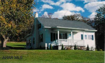 Newly renovated, new kitchen, wiring, plumbing, bathrooms, sunroom, bedroom.