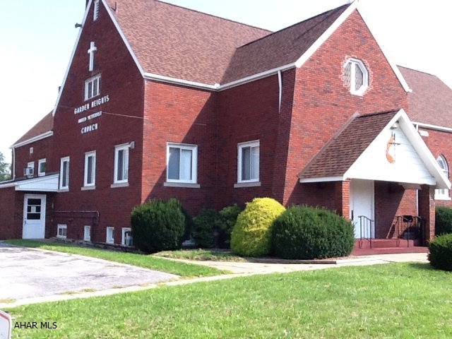 Very well maintained brick church containing sanctuary, cry room, and rest room on the main floor.  The second floor has large meeting room.  Finished basement includes kitchen, dining hall, meeting rooms, two 1/2 baths, and utility room.  Newer windows throughout and good roof.