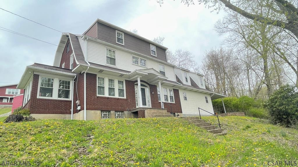 Come tour this 5-bedroom brick colonial on a double lot in Ferndale. This property features over 3,000 square feet including a separate dining room, living room and sunroom all on the first floor. The den area features a wet bar, full bathroom, gas fireplace, access to the patio and stairs leading up the loft area. The second floor offers 3 bedrooms with recently refinished hardwood floors, a second full bath and stairs leading to the 3rd which provides 2 additional heated bedrooms. As you head outside you will find a patio off the den area for all entertaining needs and recently refinished stairs in the rear up to the parking area in the rear. Call today to tour!