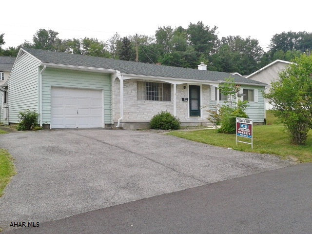 4 bedroom ranch home on quiet street in Wehnwood. Hardwood floors under carpet, newer kitchen, vinyl sided, fenced yard, 1 car garage. Needs TLC. Addition needs extensive repairs or removed. Recently appraised at $83,000.